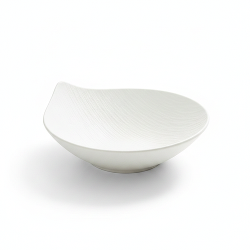 Petalo sculptural matte white porcelain salad bowl with organic petal silhouette on white