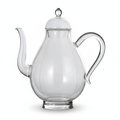 Clear borosilicate glass teapot with domed lid and curved spout on white background