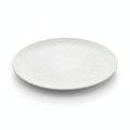 Martellato matte-white hammered-texture ceramic coupe dinner plate on white