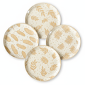 Set of four creamy beige botanical leaf ceramic plates on white