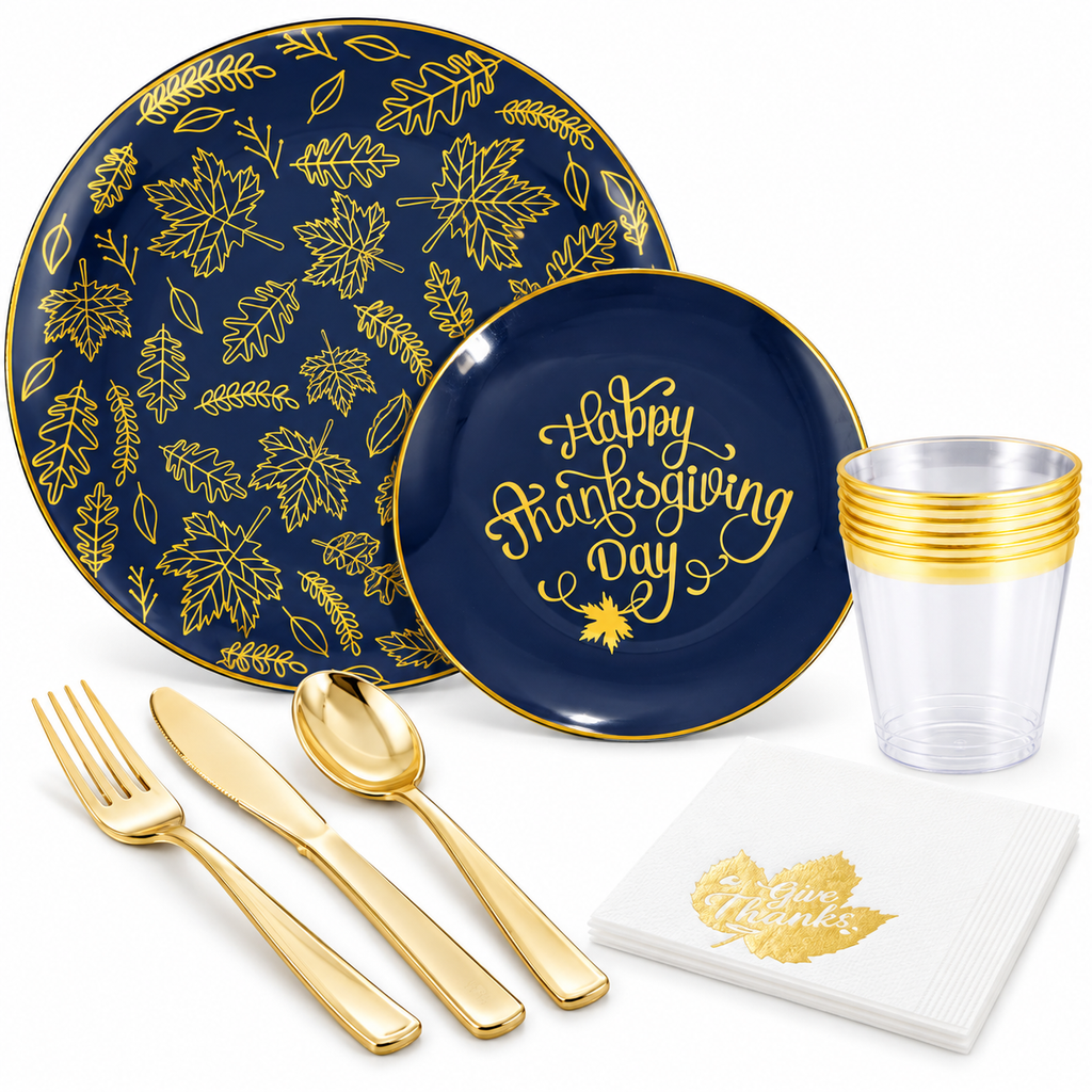 Representative navy and gold Thanksgiving tableware on white: botanical and Happy Thanksgiving Day plates, gold-rimmed cups, printed napkins and gold-tone cutlery. Not all 175 pieces are shown.