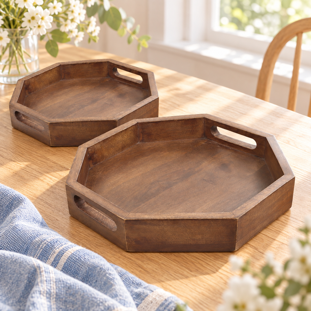 Two walnut-finish octagonal mango wood trays on a bright cream tabletop