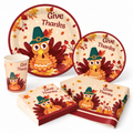 Representative Give Thanks turkey tableware assortment on white: large and small plates, printed cup, napkins and folded table cover. Not all 102 pieces are shown.