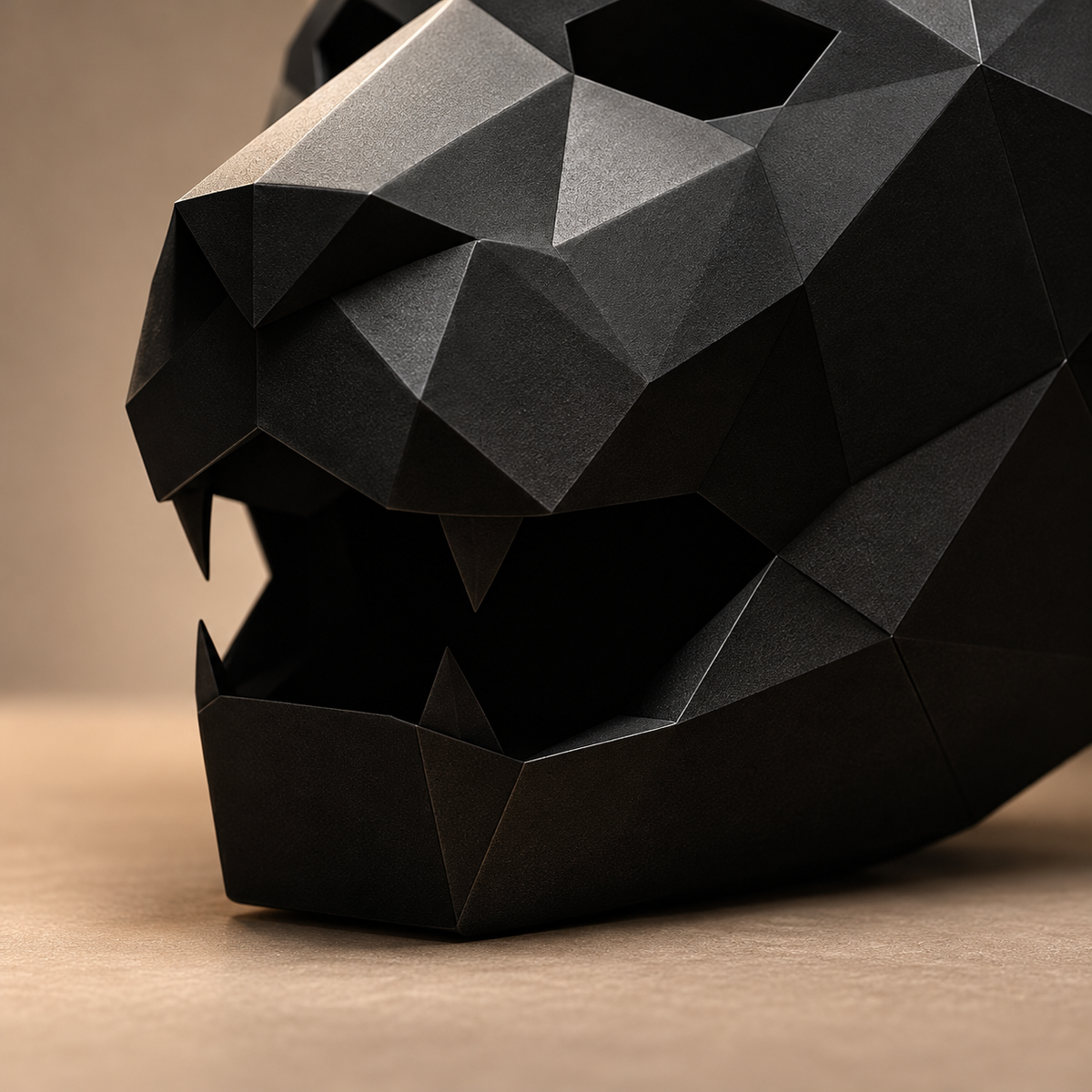 Close view of the black mask's angular muzzle, visible pointed teeth and fixed jaw outline.