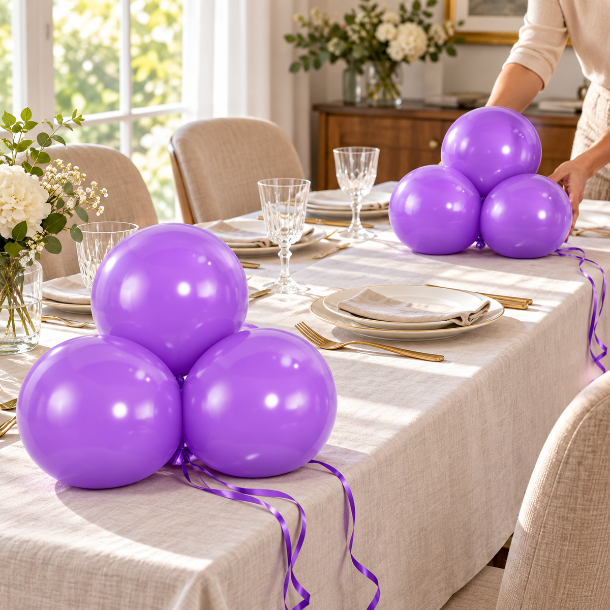 Two small representative purple balloon groups on a party table; styling props not included.