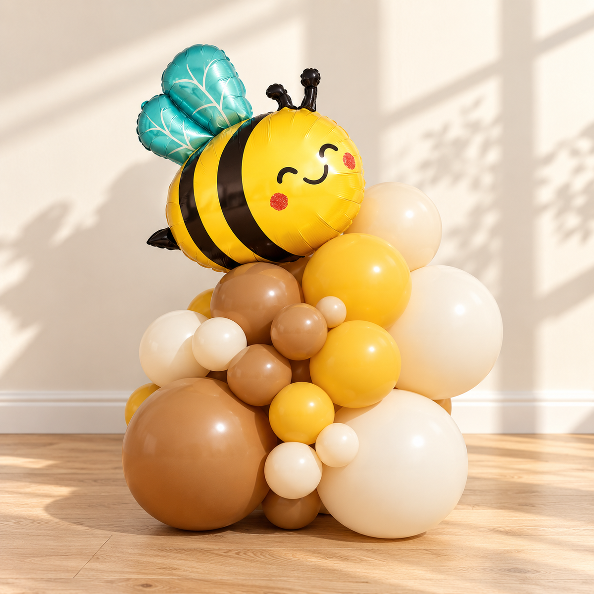 Representative bee-themed balloon cluster from the garland kit; not the full kit. Background styling is not included.