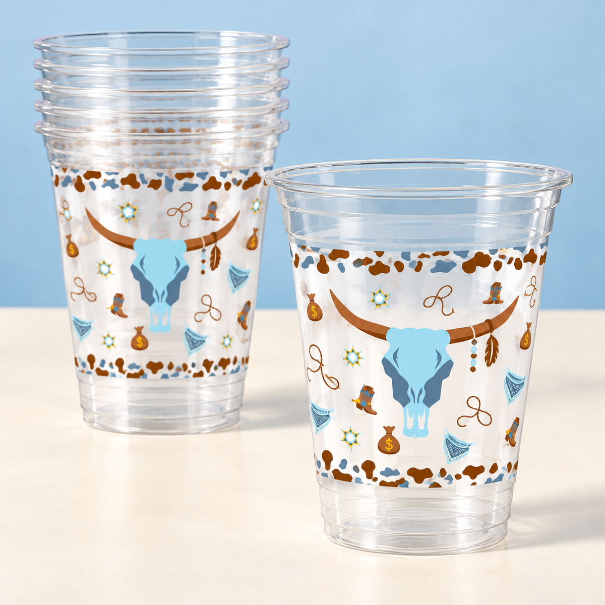 Nested clear Blue Cowboy cups and the longhorn motif; representative portion of the 100-pack.