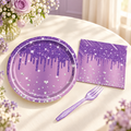 Representative purple glitter-print party tableware setting from the 72-piece set; not all pieces shown. Styling accessories are not included.