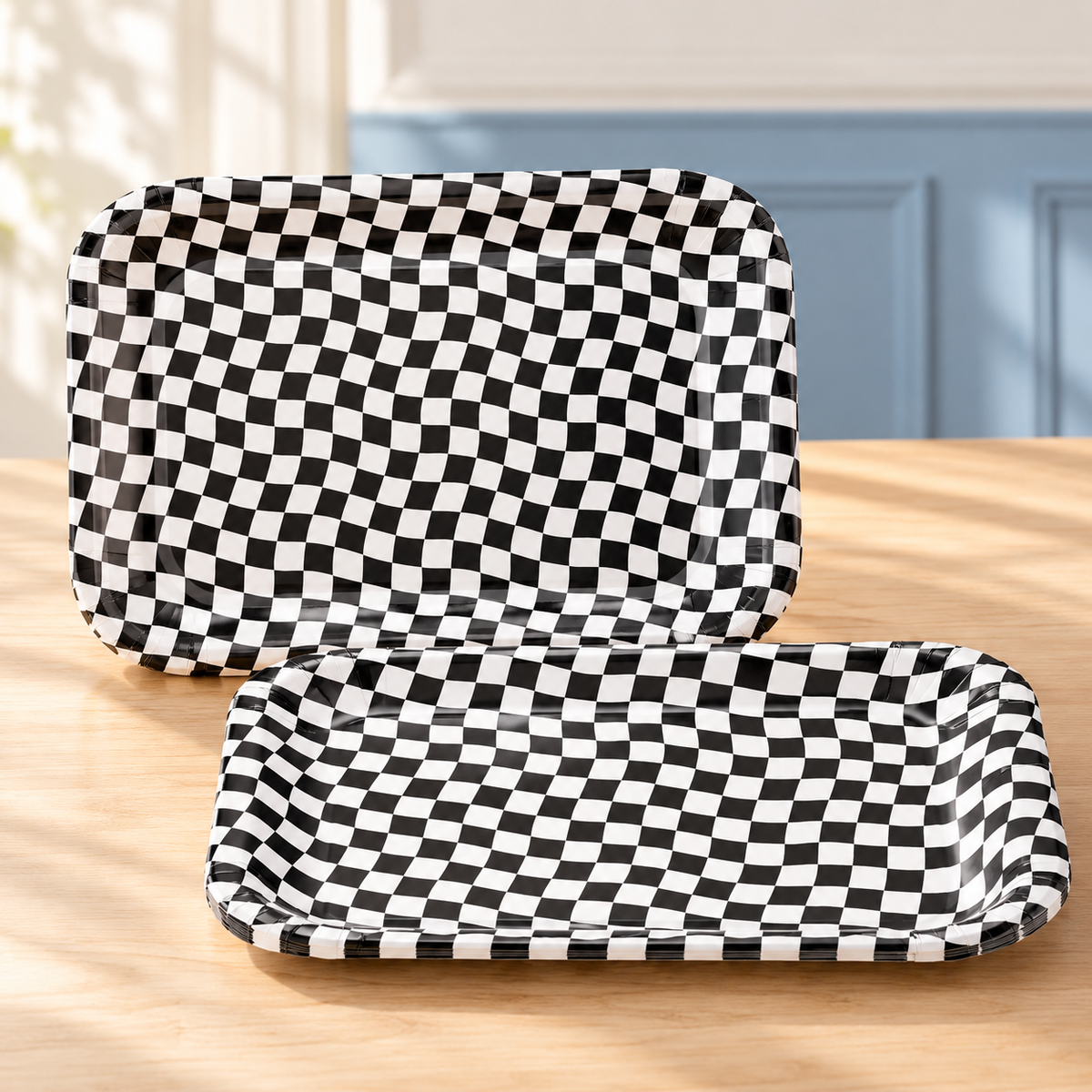 Two representative black-and-white race-flag paper trays from the 24-pack; not all trays shown.