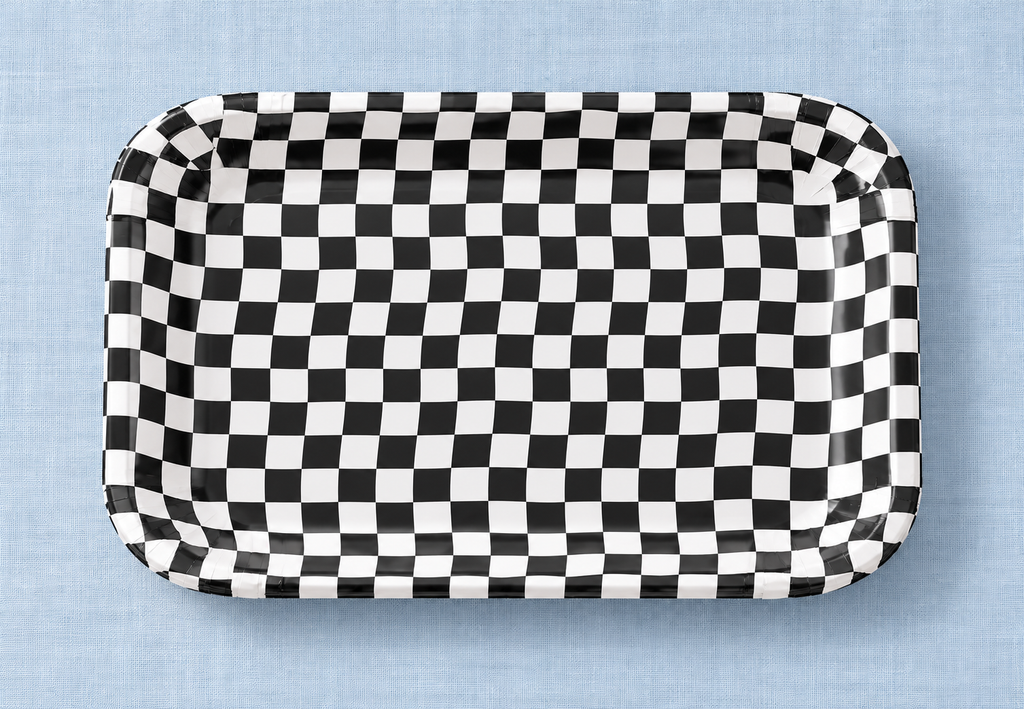 Overhead view of the rectangular black-and-white checkered paper tray; linen not included.