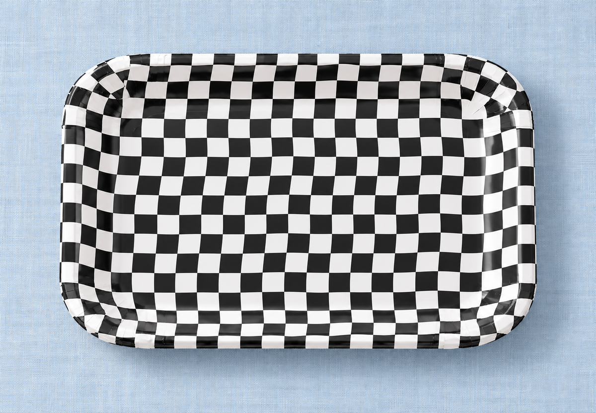 Overhead view of the rectangular black-and-white checkered paper tray; linen not included.