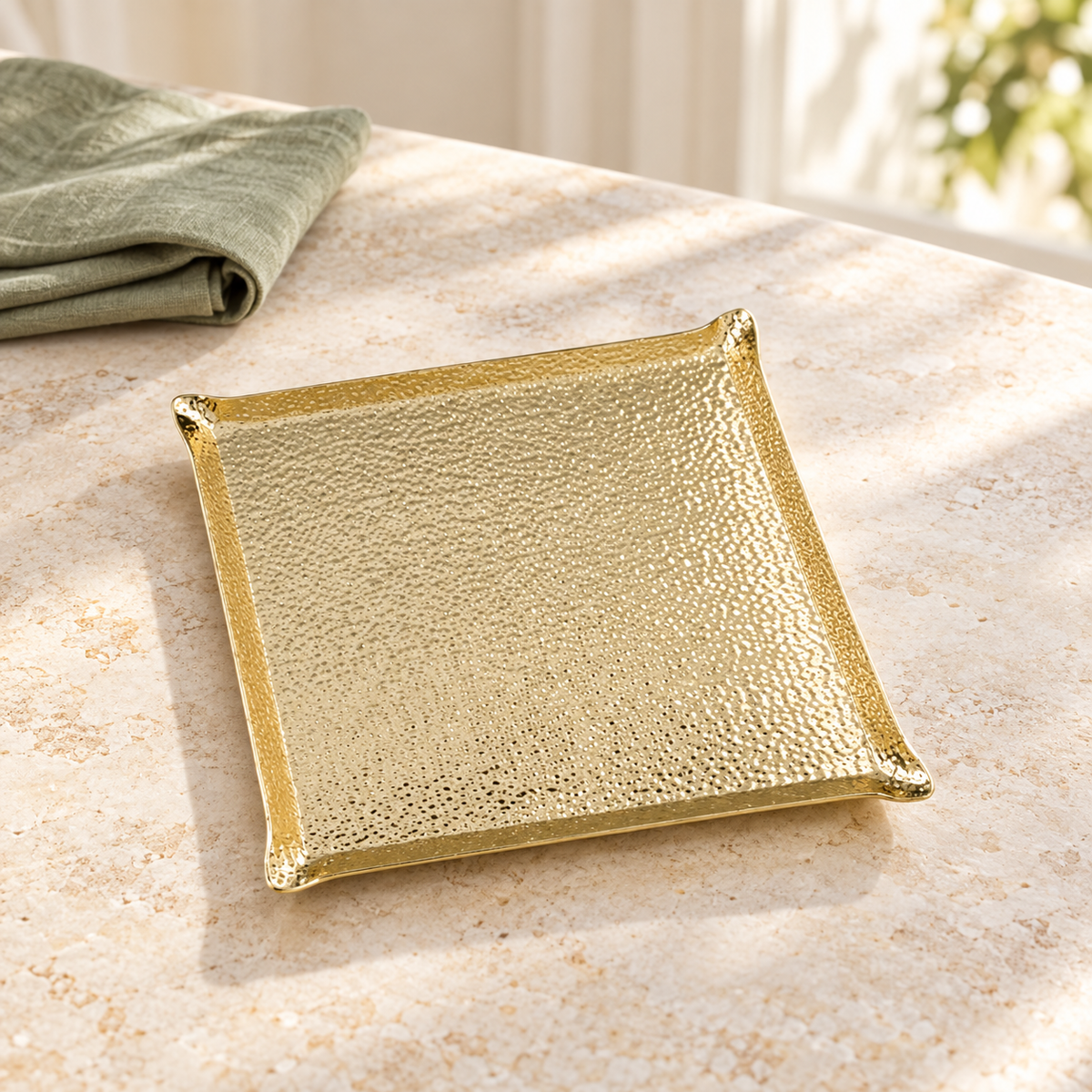 Gold square large hammered serving tray in a bright setting; rectangular variants are not pictured. Styling accessories are not included.
