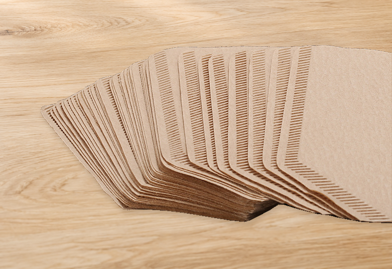 Close-up of the fanned paper filter edges and sealed seam.
