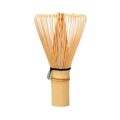 Full bamboo matcha whisk on a clean white background.