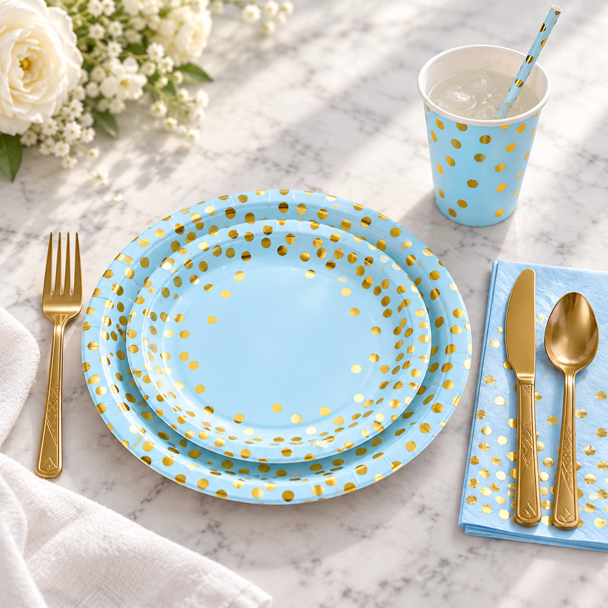 One blue and gold-dot place setting; representative selection from the celebration kit.