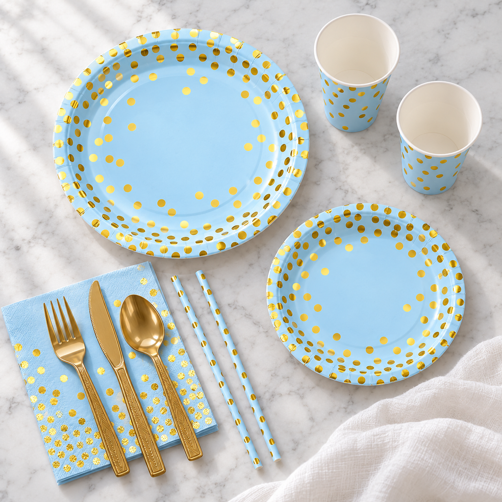 Overhead arrangement of blue and gold-dot party tableware; representative selection.