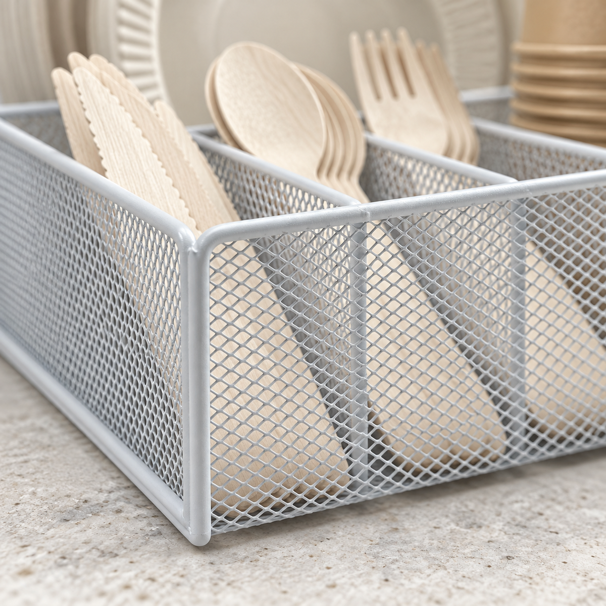 Close-up of the white mesh caddy rim, corner and cutlery dividers. Tableware and styling props not included.