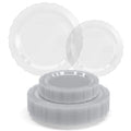 Clear Victorian-style plates in two sizes on white; representative selection from the set.
