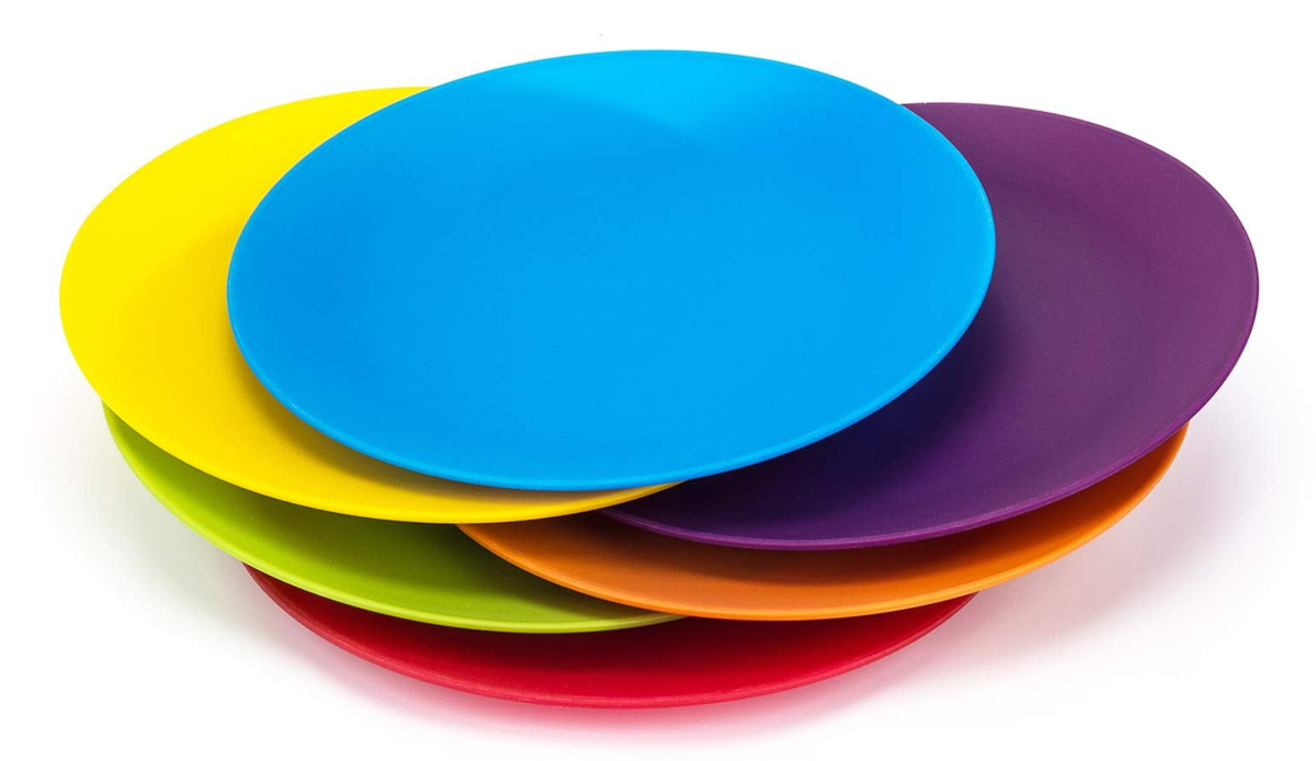 Assorted-colour plates on white; representative stack from the 12-plate set.