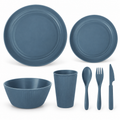 One seven-piece dark blue place-setting subset of the 42-piece dining set. White background product photograph.