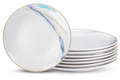 Gilded Edge white ceramic dessert plates with a thin gold rim and asymmetric blue, turquoise and gold edge decoration on a white background. Representative arrangement from the set.