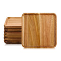 Square acacia wood plates on white; representative arrangement from the set.