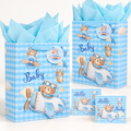 Two blue baby gift bags with matching round tags, cyan tissue and Hello Baby greeting cards.