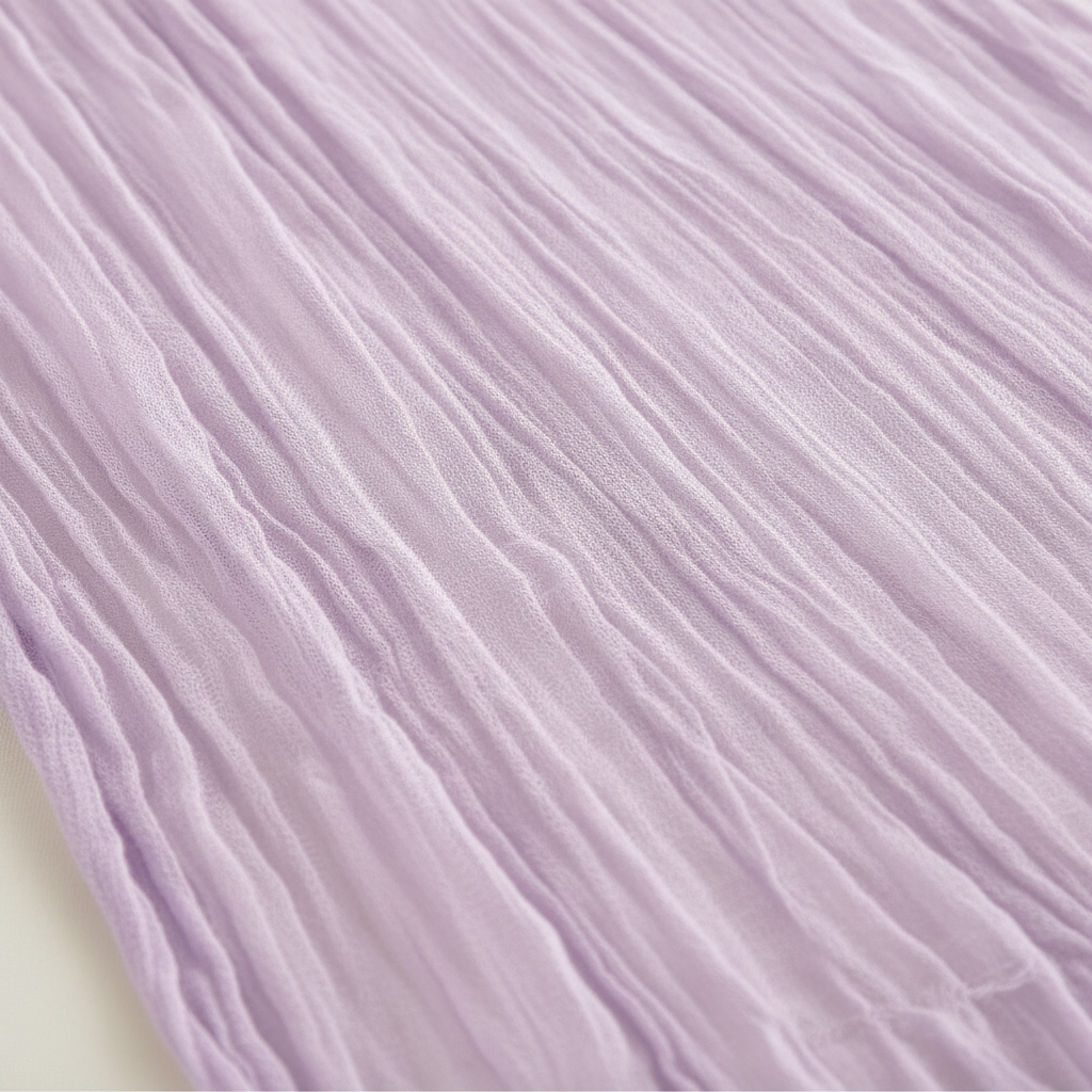 Close-up of the sheer crinkled lavender gauze cheesecloth weave