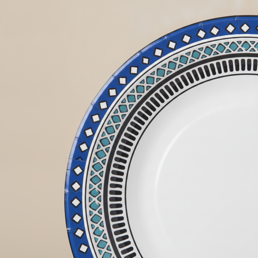 Macro close-up of blue patterned border rim on a white paper plate