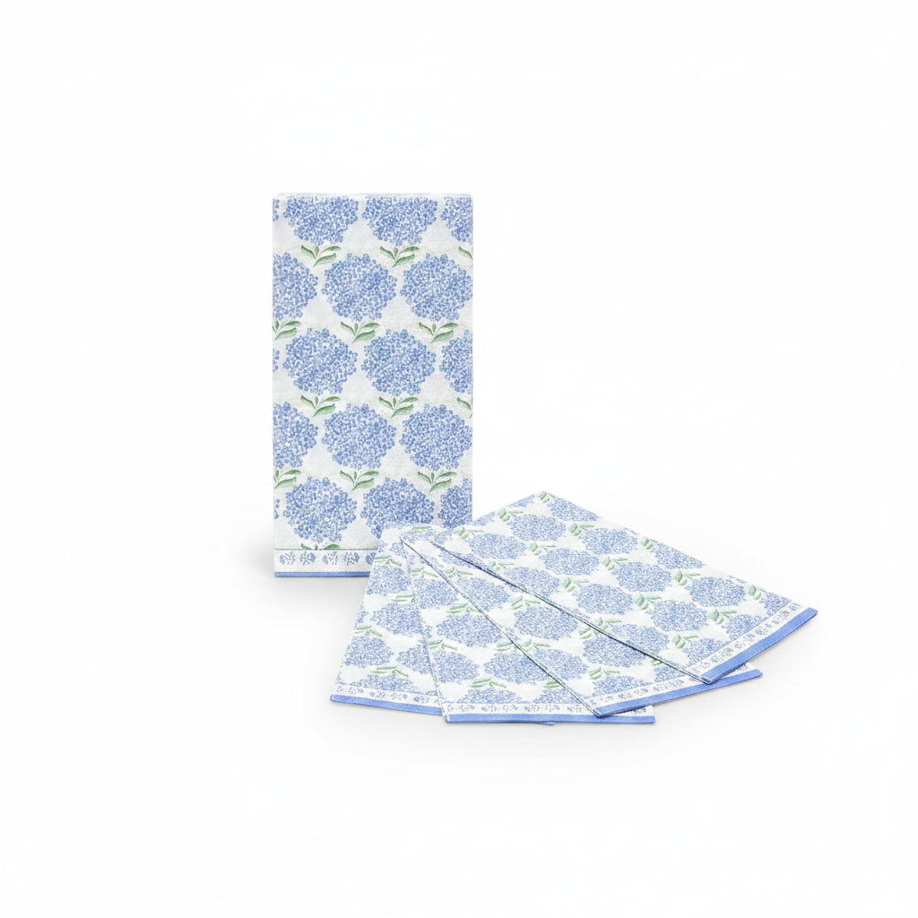 Blue hydrangea floral 3-ply paper guest napkins, fanned stack on white