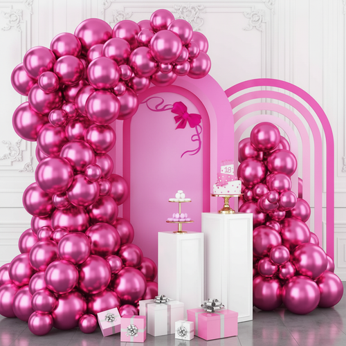 Metallic fuchsia balloon garland arching over a glamorous birthday dessert table