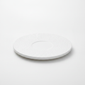 Pietra round matte white stone-textured porcelain dinner plate on white