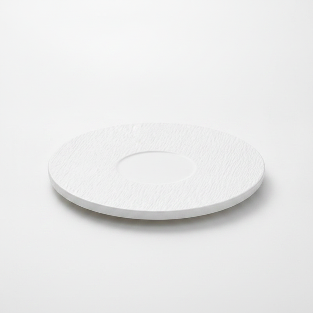 Pietra round matte white stone-textured porcelain dinner plate on white