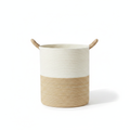 Tall two-tone woven cotton rope storage basket with rope handles on white background