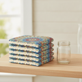 Folded stack of six mandala microfiber dishcloths on a shelf — Maison's Kitchen