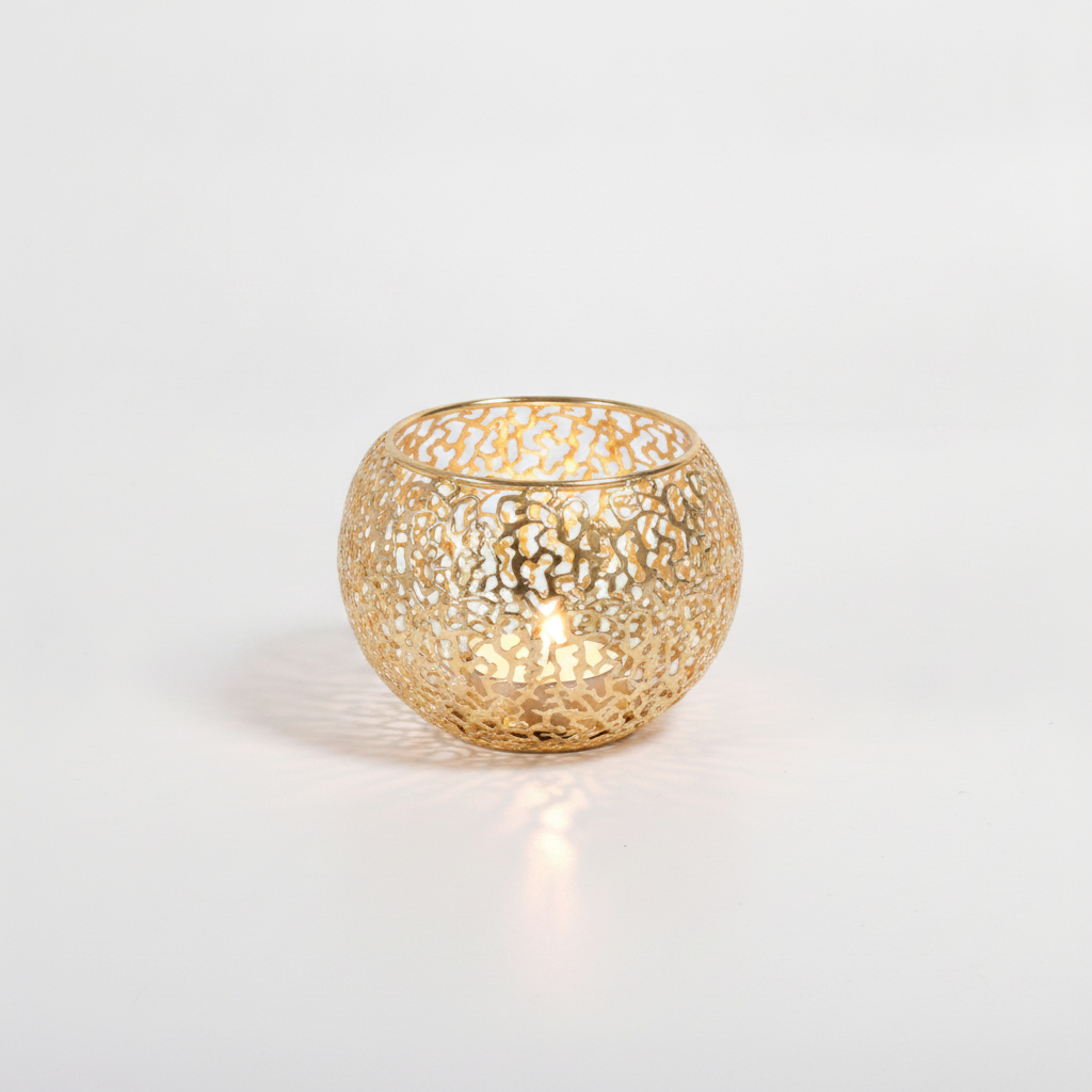 Merletto gold lace orb candle holder with glowing tealight on white