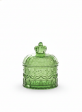 Green crown-lidded embossed glass storage jar on white background