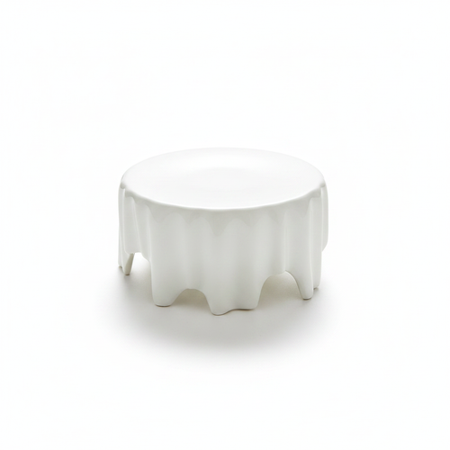 Cascata white glazed ceramic tall serving riser with organic molten dripping edge, studio white background