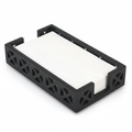 Black wood napkin and guest towel holder tray with open lattice sides holding folded napkins