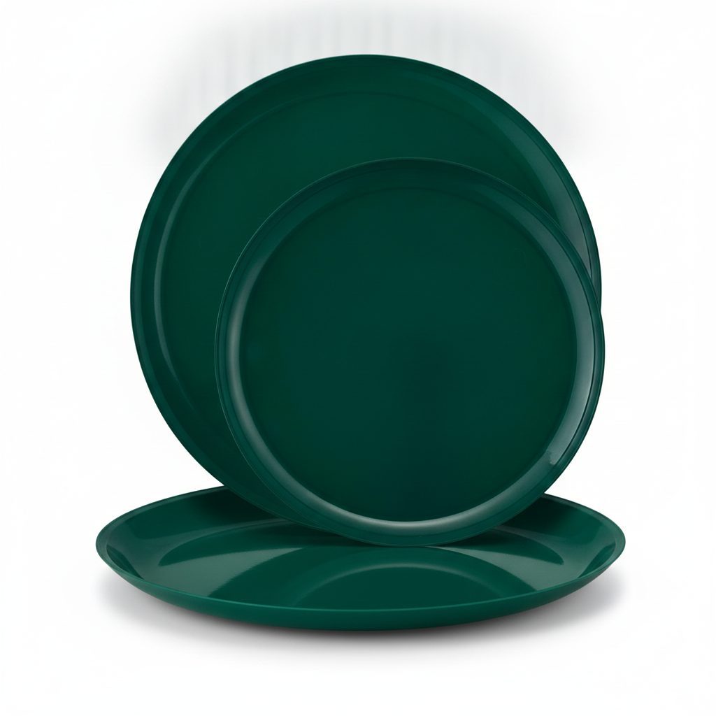 Forest green disposable plastic party plates in two sizes on a clean neutral studio background