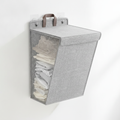 Gray linen wall-hung mesh-front laundry storage organizer on white background