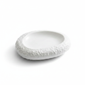 Scoglio irregular oval white porcelain plate with raised rock-textured rim on white