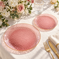 Transparent rose-burgundy hammered plates with a thin gold rim, styled table scene. Food and styling props not included.
