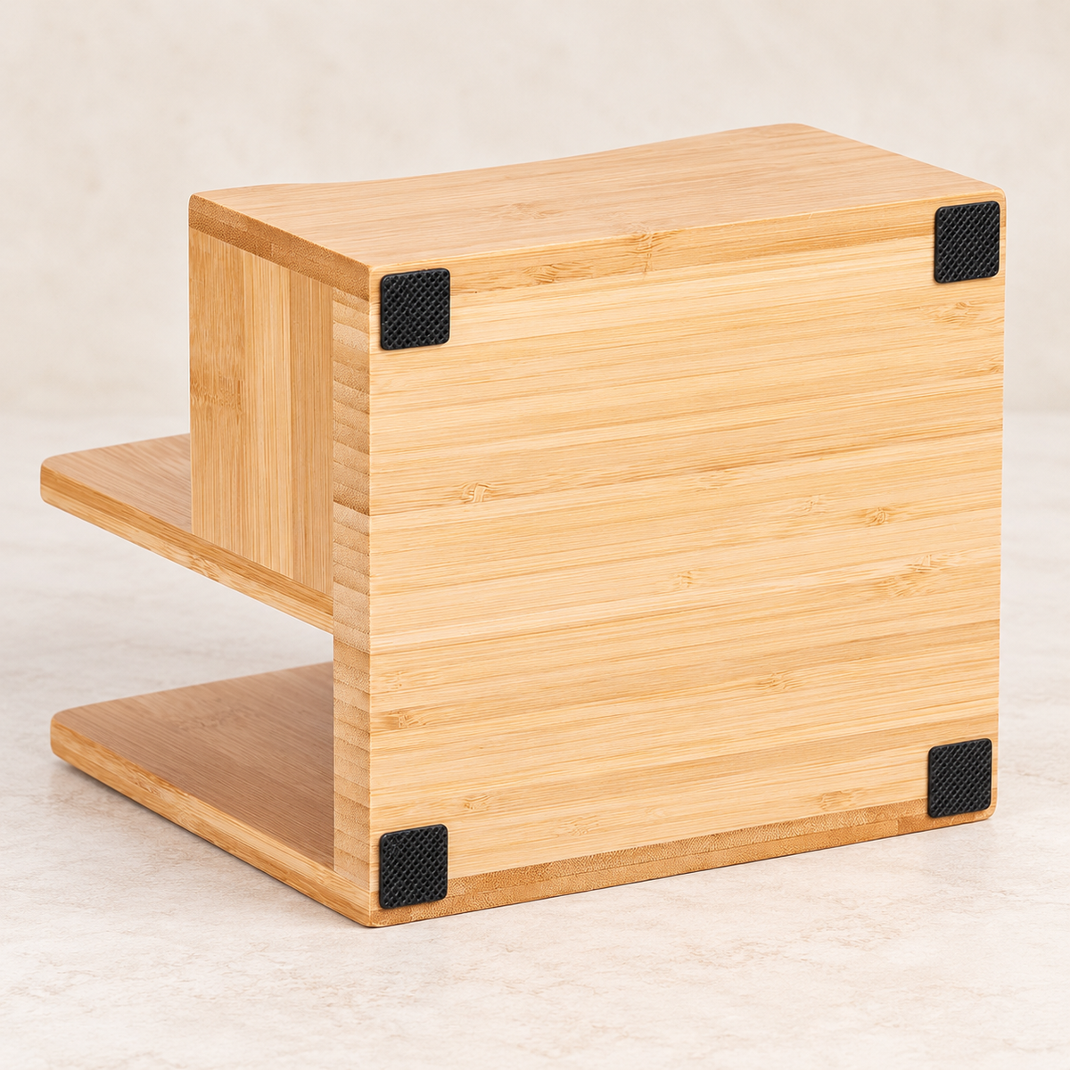 Bamboo napkin caddy — underside four black pads. Styling props not included.