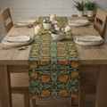 Sage green floral burlap runner styled down the center of a farmhouse dining table