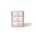 Clear plastic multi-layer desk drawer organizer with rabbit knobs on white background