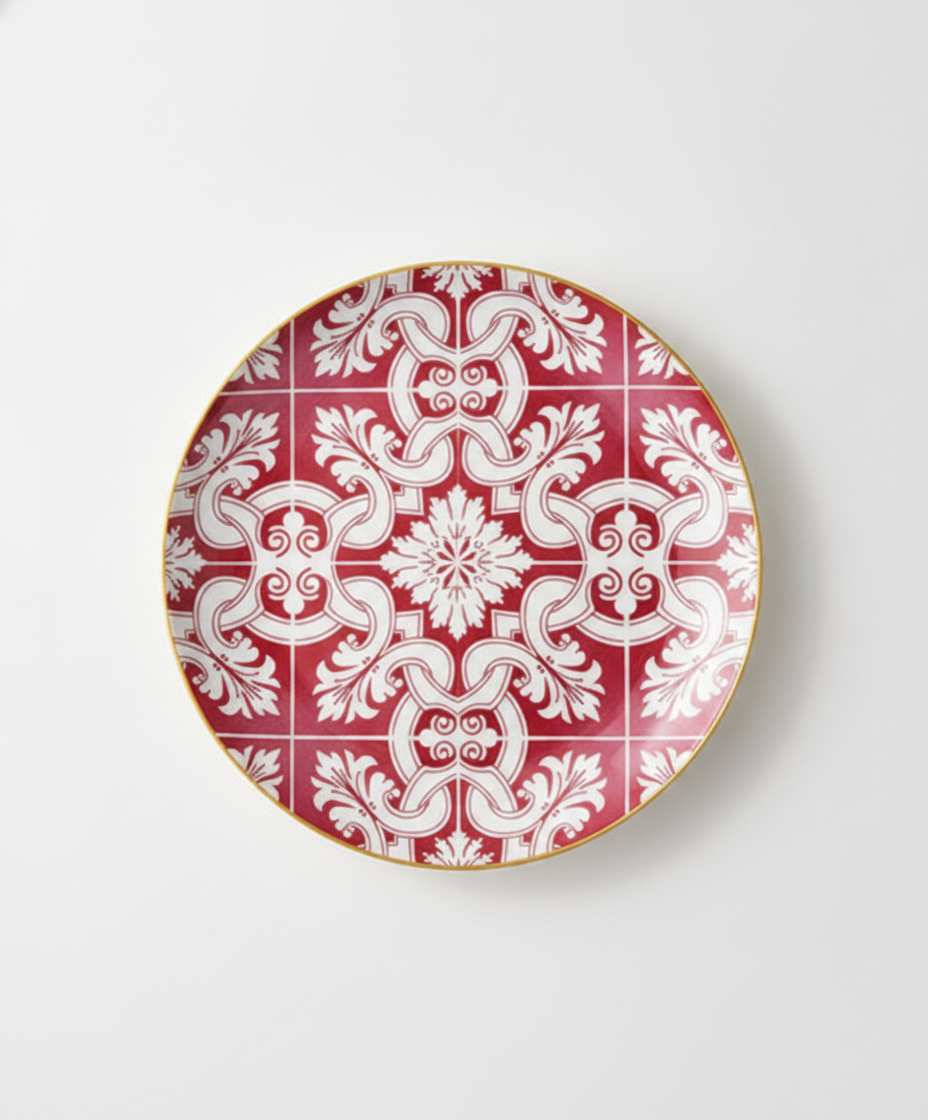 Red and white Mediterranean mosaic tile ceramic dinner plate with gold rim on white background
