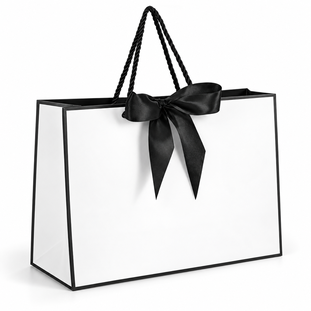 White gift bag with black border, cord handles and satin bow on white background