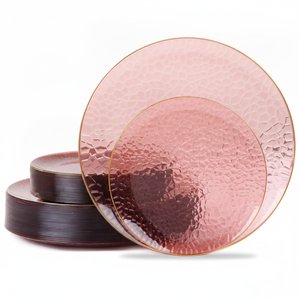 Stack of translucent rose-burgundy gold-rim hammered disposable plastic plates on white