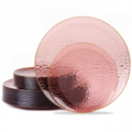 Stack of translucent rose-burgundy gold-rim hammered disposable plastic plates on white